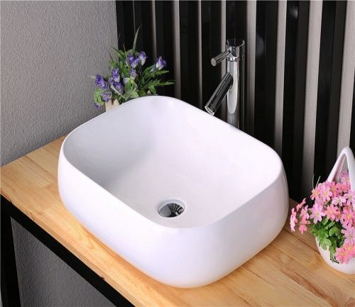 Раковина из сантехнического фаянса CeramaLux 9243 60х40 накладная цвет белый без отверстий под смеситель