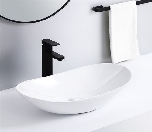 Раковина из сантехнического фаянса CeramaLux 7811A 60х40 накладная цвет белый без отверстий под смеситель