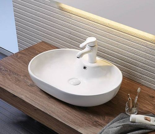 Раковина из сантехнического фаянса CeramaLux 9163 60х40 накладная цвет белый 1 отверстие под смеситель