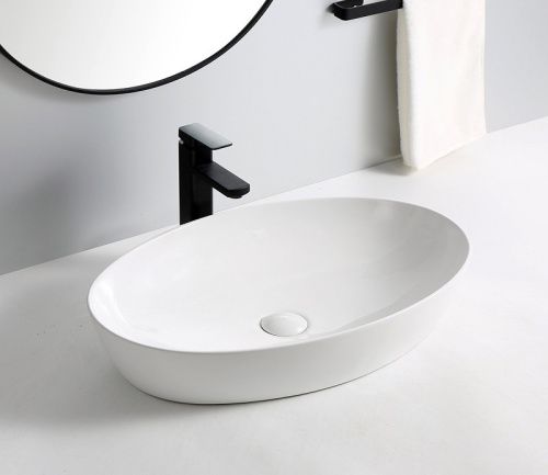 Раковина из сантехнического фаянса CeramaLux 9433 60х40 накладная цвет белый без отверстий под смеситель