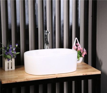 Раковина из сантехнического фаянса CeramaLux 9025-1 60х40 накладная цвет белый без отверстий под смеситель