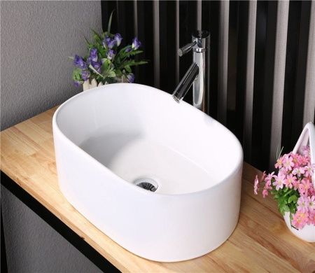 Раковина из сантехнического фаянса CeramaLux 9025-1 60х40 накладная цвет белый без отверстий под смеситель