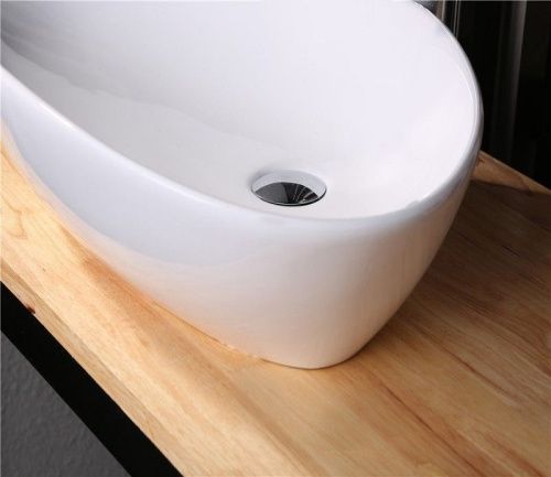 Раковина из сантехнического фаянса CeramaLux 7472B 60х40 накладная цвет белый без отверстий под смеситель - фото 4