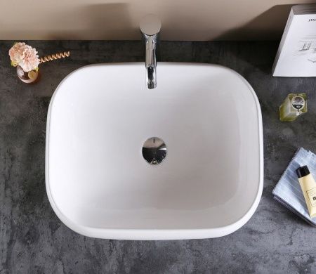 Раковина из сантехнического фаянса CeramaLux 9243 60х40 накладная цвет белый без отверстий под смеситель