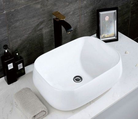 Раковина из сантехнического фаянса CeramaLux 9243 60х40 накладная цвет белый без отверстий под смеситель