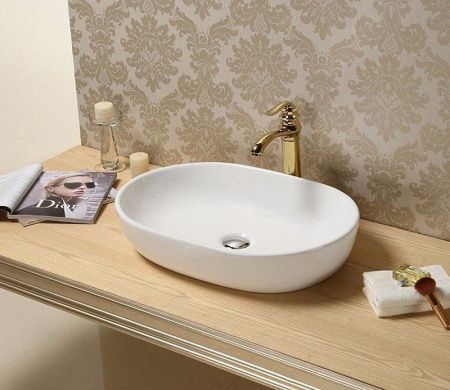 Раковина из сантехнического фаянса CeramaLux 9026A 60х40 накладная цвет белый без отверстий под смеситель